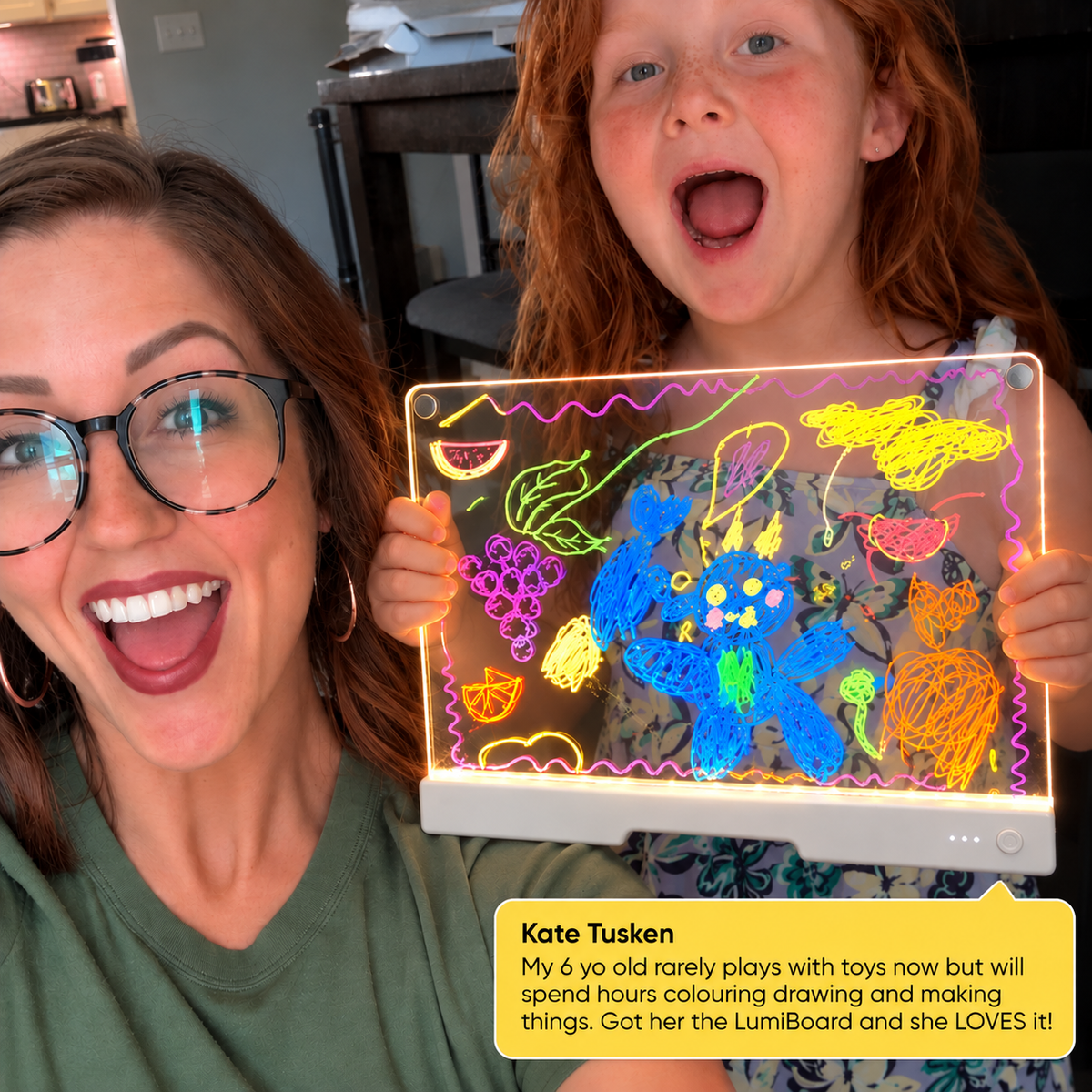 Girl holding GlowSketch V2 with positive customer feedback